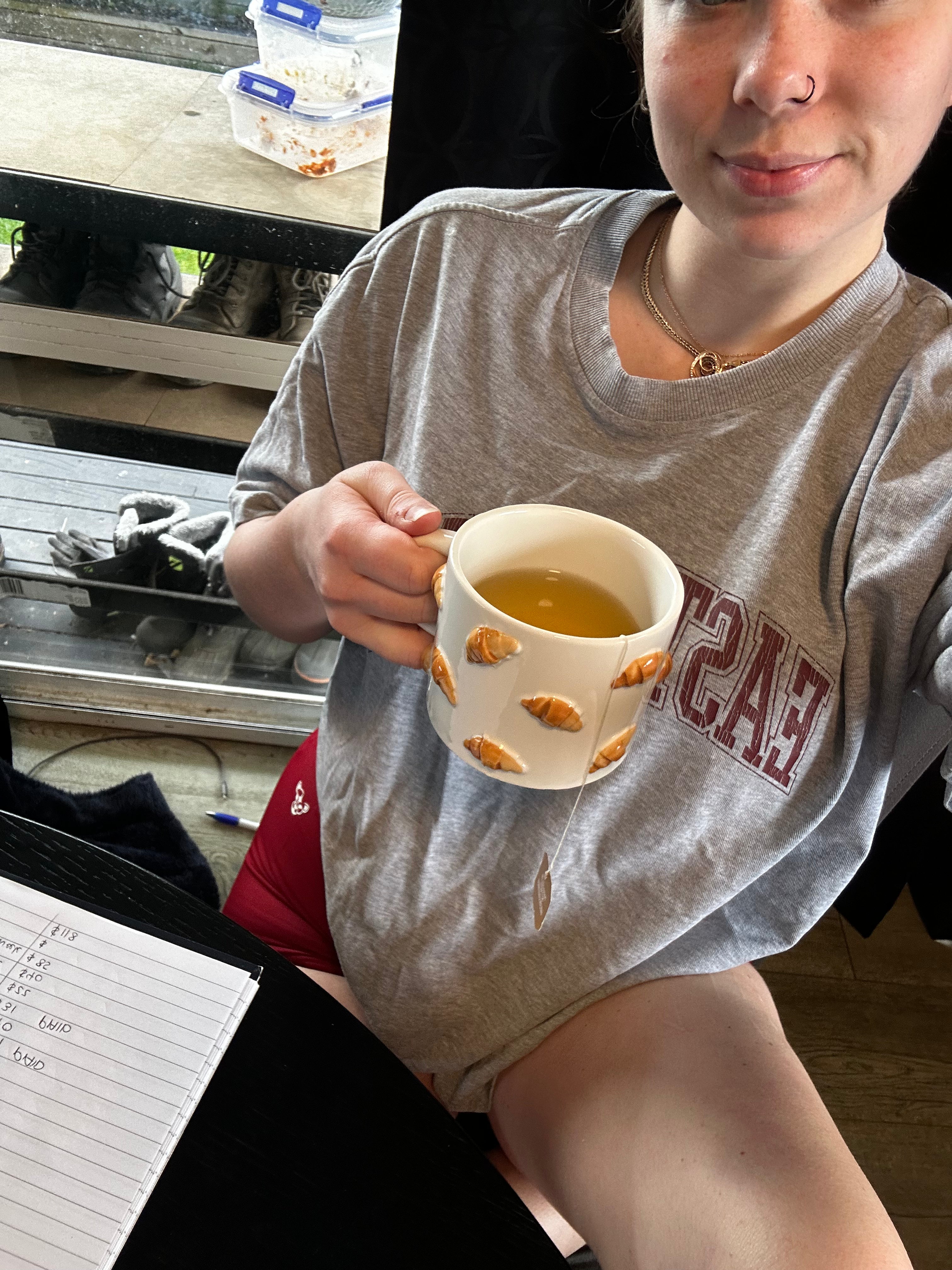 Woman relaxing in comfortable AMSO activewear